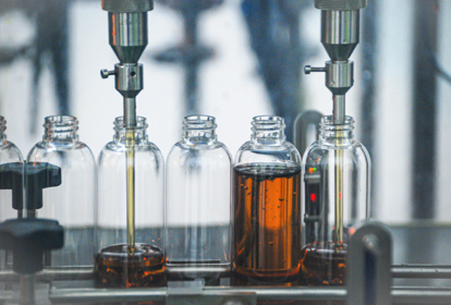 Bottles being filled on production line at Blends Holdings