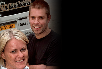 Hero banner - Debbie & Richard in front of Bury Black Pudding Company van